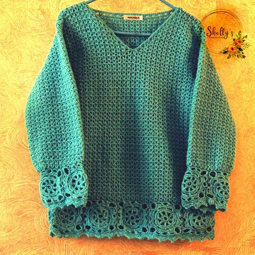 Crochet pullover with lace design 